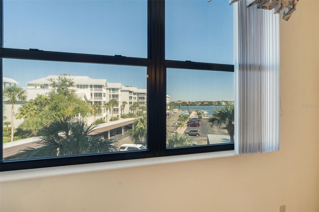5855 Midnight Pass Road, Unit 318 Sarasota, FL 34242 - Photo 24 of 40 a view of lot of a window