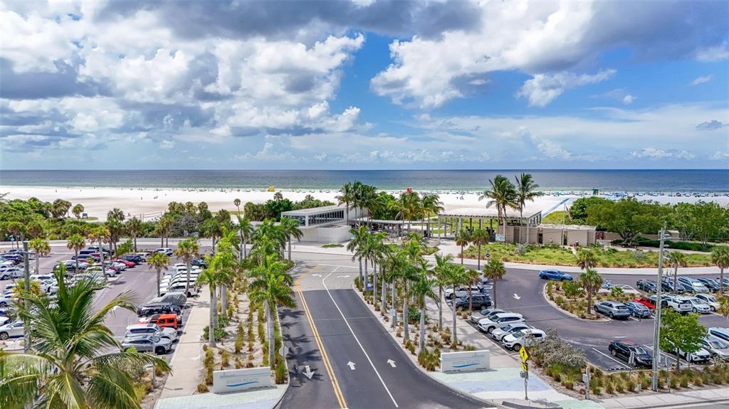 5855 Midnight Pass Road, Unit 318 Sarasota, FL 34242 - Photo 38 of 40 a view of a house with a yard