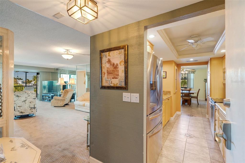 5855 Midnight Pass Road, Unit 318 Sarasota, FL 34242 - Photo 8 of 40 a view of a livingroom with furniture and windows