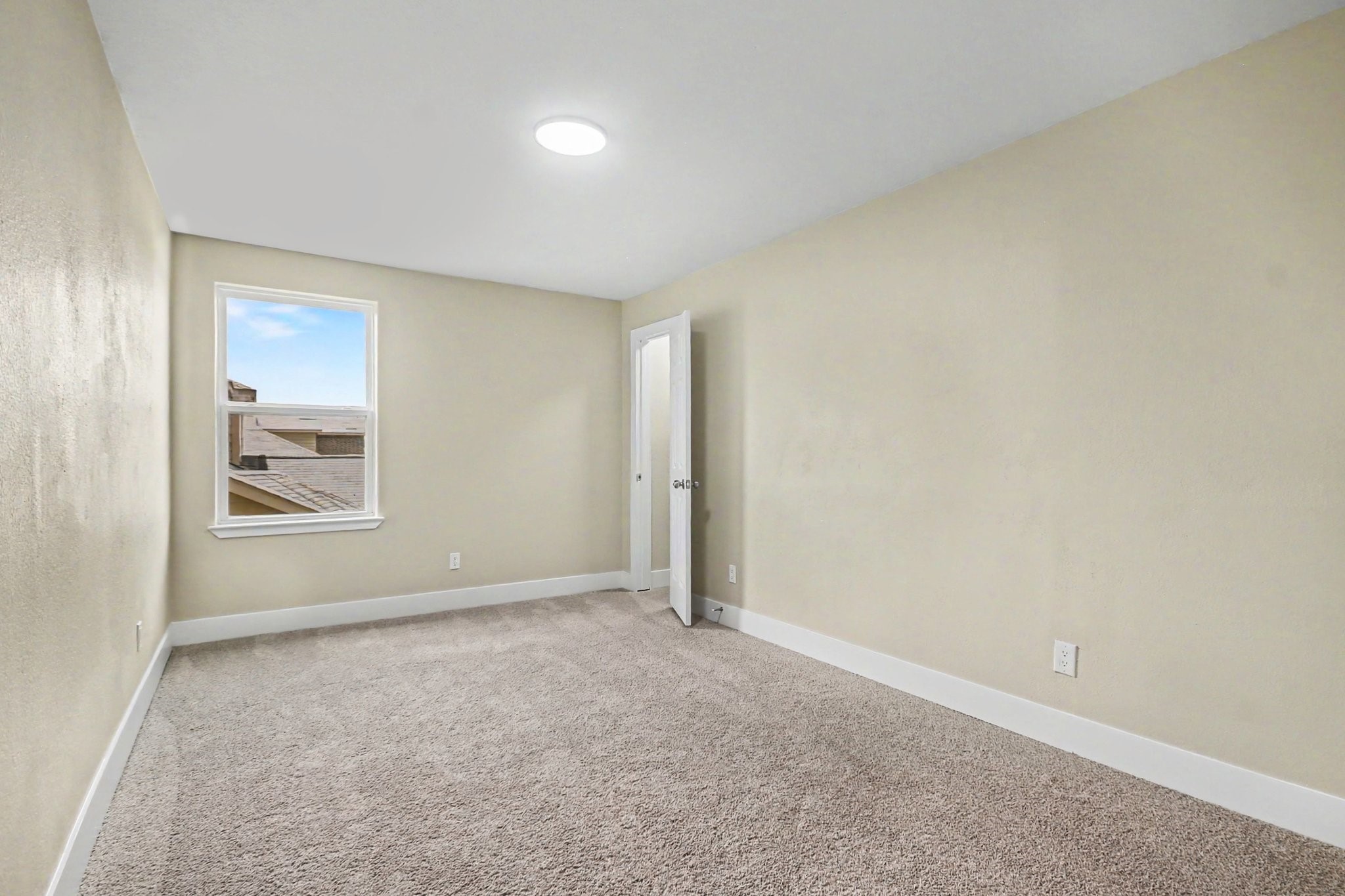 1322 Diamond Drape Drive Rosharon, TX 77583 - Photo 27 of 45 an empty room with windows