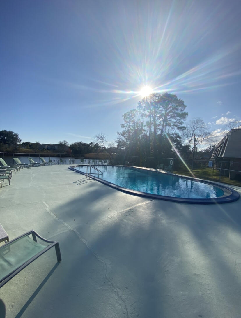 210 Pelham Road, Unit 213A Fort Walton Beach, FL 32547 - Photo 16 of 16 a view of a lake