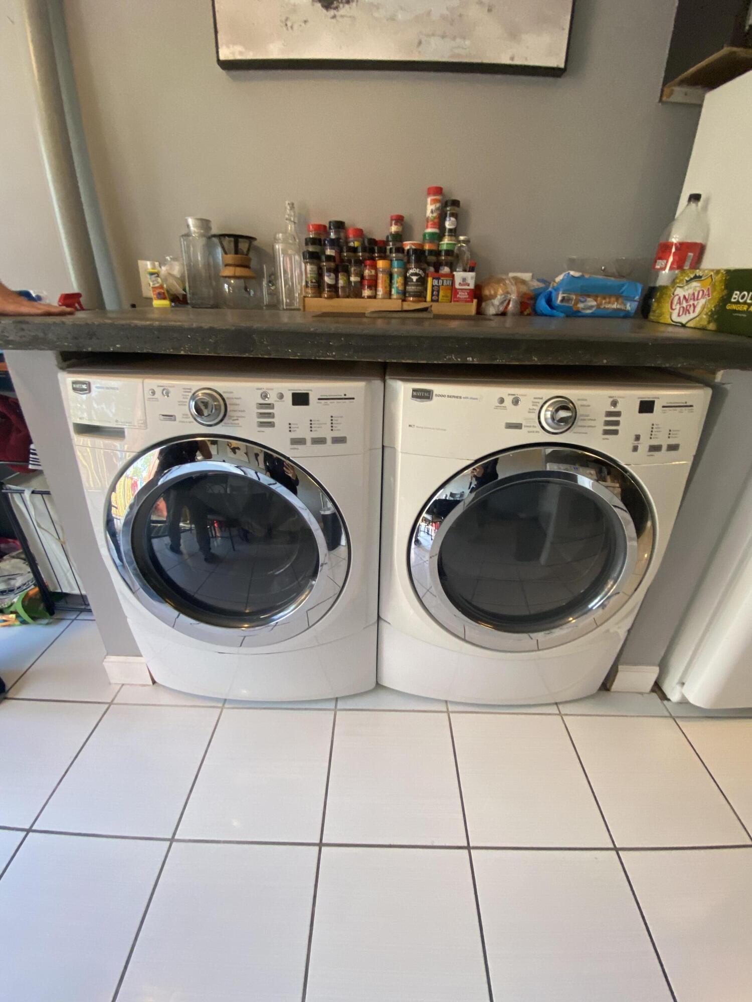 210 Pelham Road, Unit 213A Fort Walton Beach, FL 32547 - Photo 7 of 16 a utility room with dryer and washer