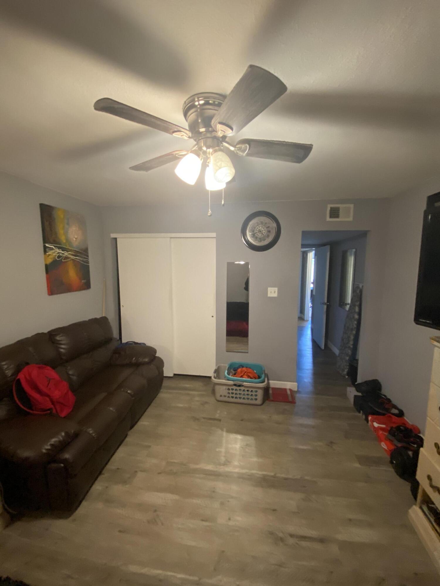 210 Pelham Road, Unit 213A Fort Walton Beach, FL 32547 - Photo 10 of 16 a living room with furniture