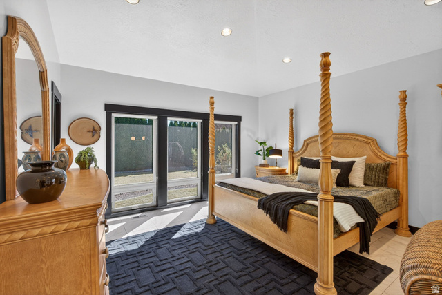145 Carnesecca Court Mapleton, UT 84664 - Photo 49 of 109 Tiled bedroom with recessed lighting and access to exterior