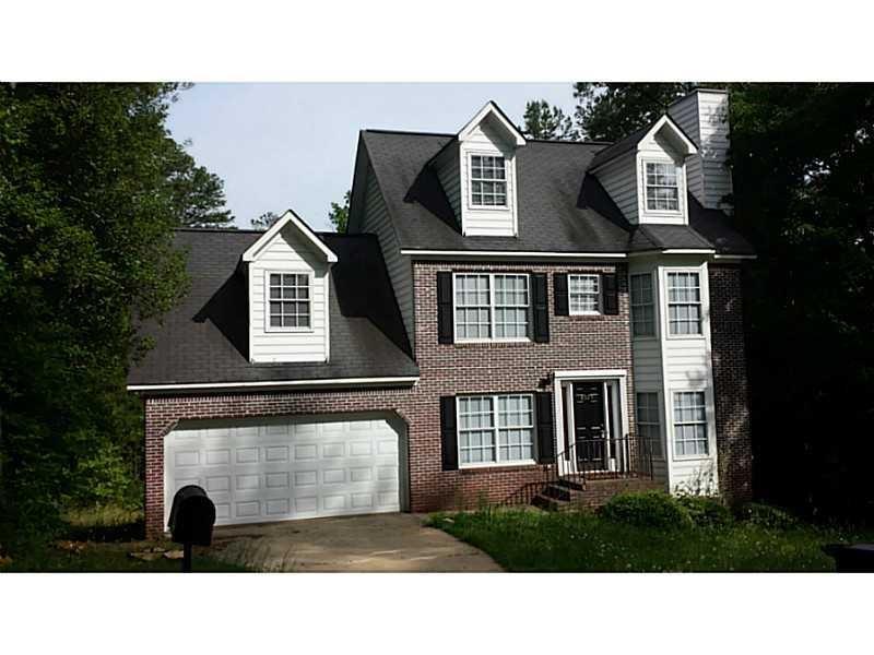 a black and white photo of a house