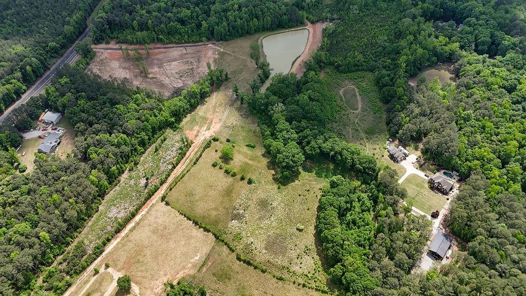708 Youth Jersey Road Monroe, GA 30655 - Photo 4 of 7 an aerial view of residential house with outdoor space and trees all around