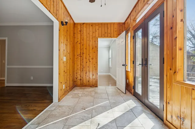 a view of a bathroom with shower and window