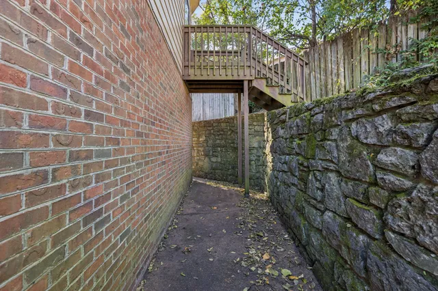 a view of a pathway both side of building
