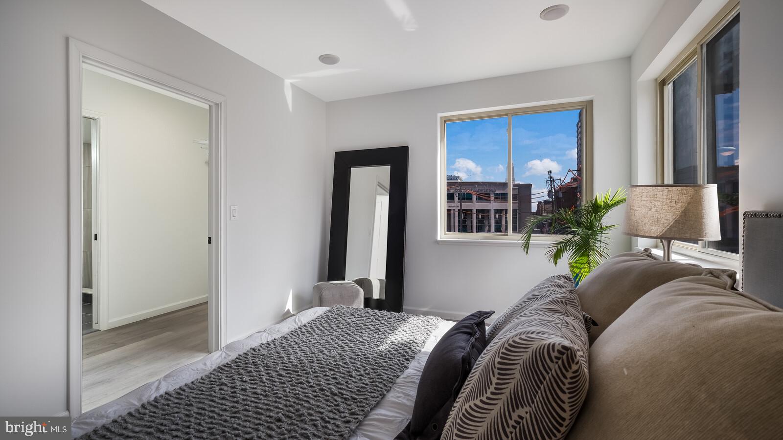 1825 Callowhill Street, Unit 311 Philadelphia, PA 19130 - Photo 21 of 50 a bedroom with a bed and a window