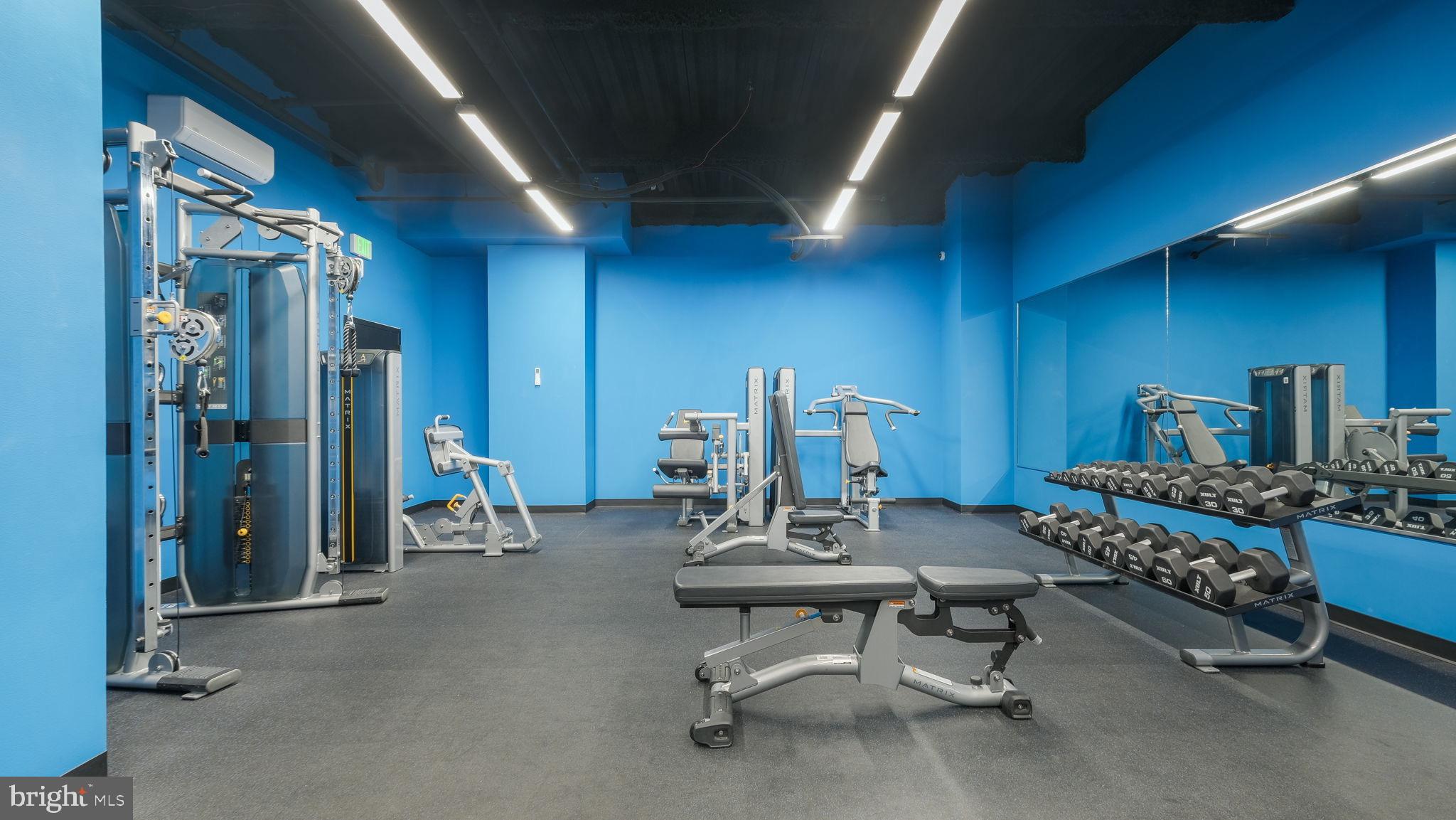 1825 Callowhill Street, Unit 311 Philadelphia, PA 19130 - Photo 28 of 50 a living room with furniture and a table
