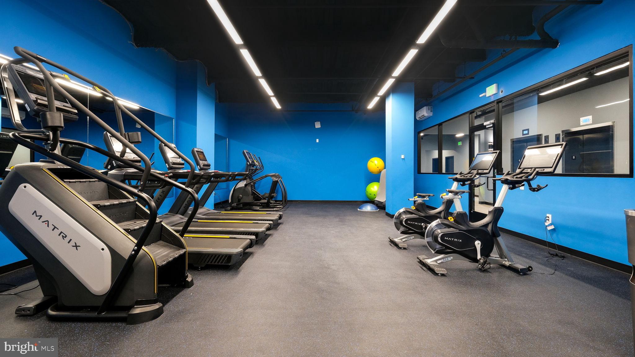 1825 Callowhill Street, Unit 311 Philadelphia, PA 19130 - Photo 34 of 50 a view of a room with gym equipment