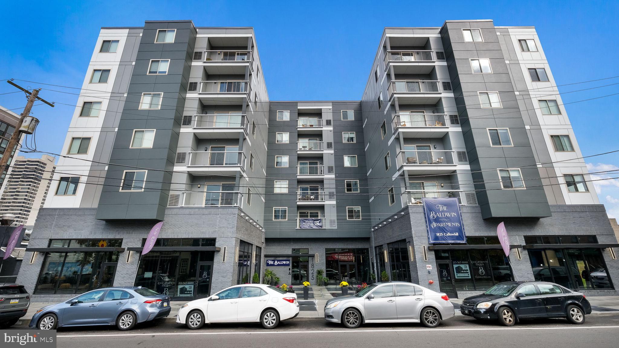 1825 Callowhill Street, Unit 311 Philadelphia, PA 19130 - Photo 36 of 50 a view of a car parked in front of a building