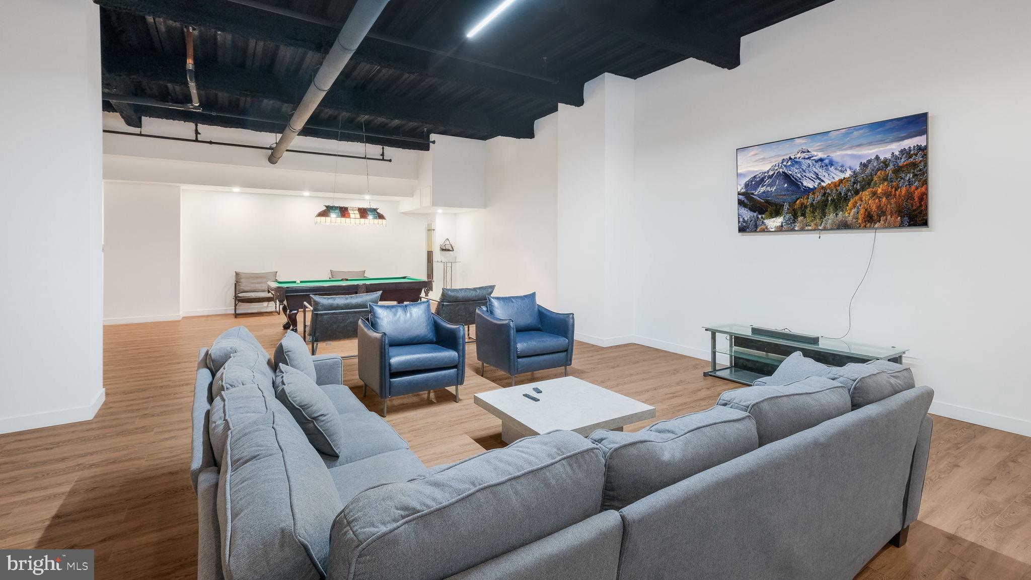 1825 Callowhill Street, Unit 311 Philadelphia, PA 19130 - Photo 47 of 50 a living room with furniture