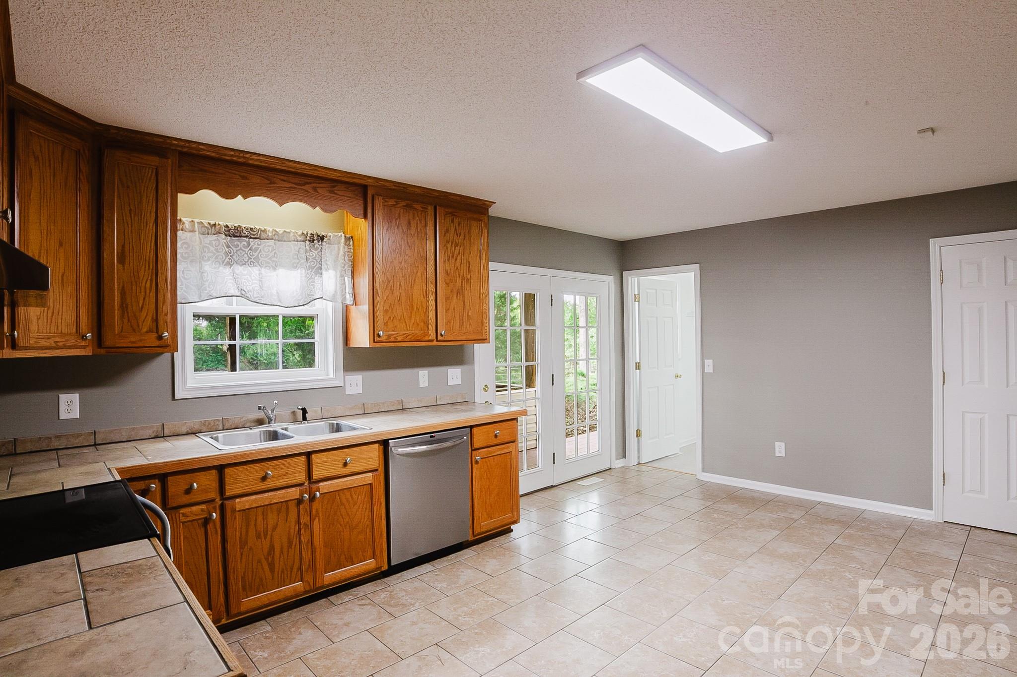 2104 Badin Road Albemarle, NC 28001 - Photo 11 of 46 a large kitchen with a large window