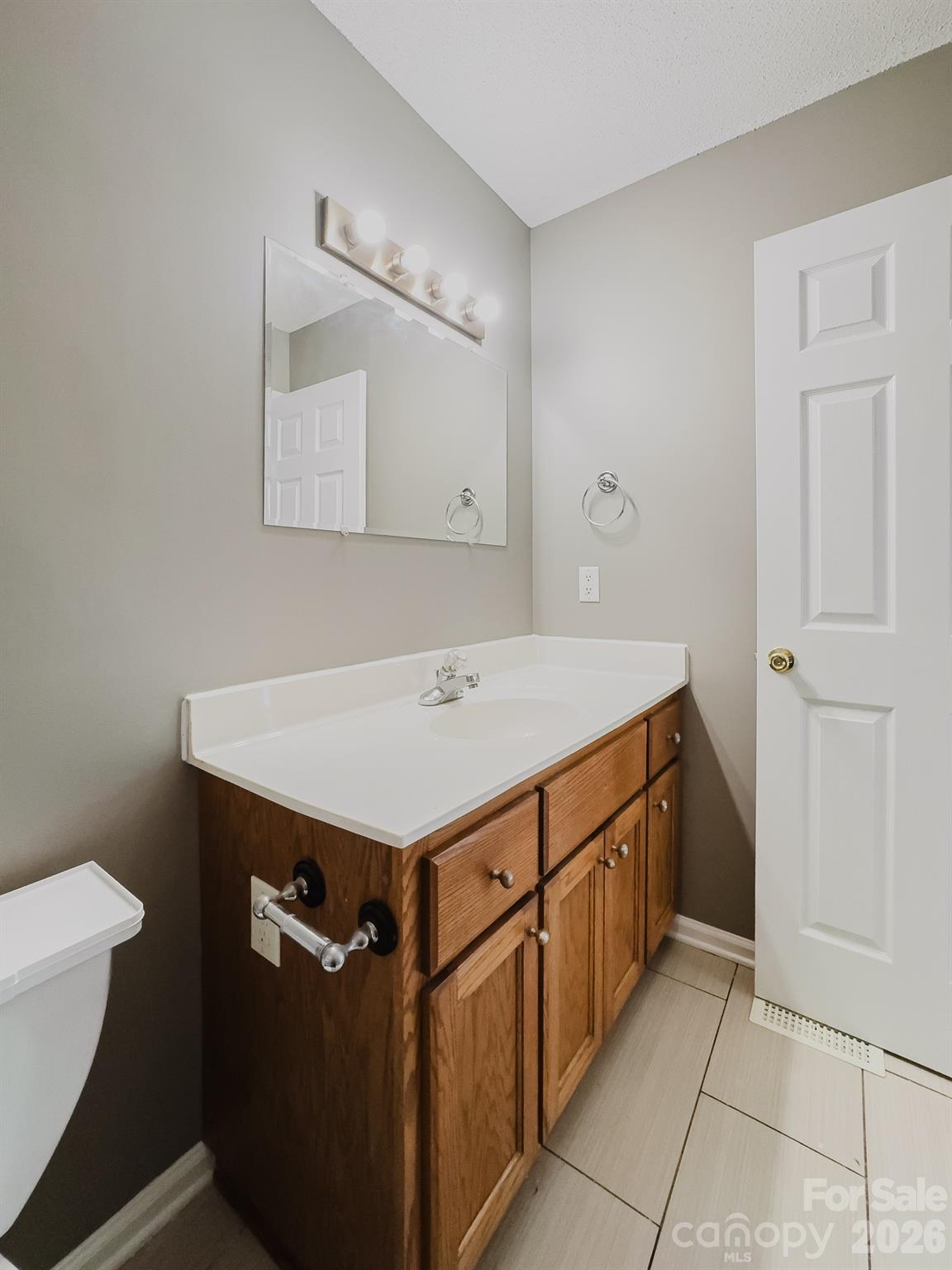 2104 Badin Road Albemarle, NC 28001 - Photo 18 of 46 a utility room with cabinets
