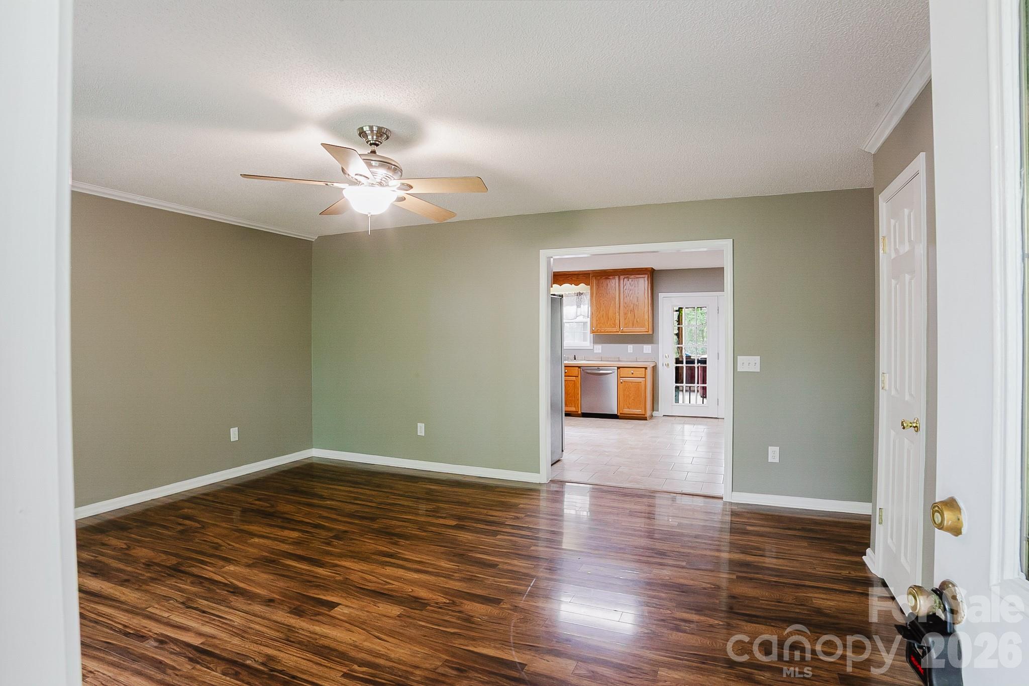 2104 Badin Road Albemarle, NC 28001 - Photo 2 of 46 wooden floor in an empty room with a window