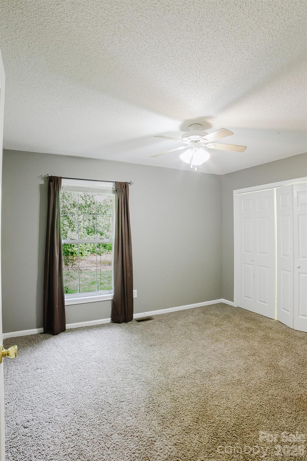 2104 Badin Road Albemarle, NC 28001 - Photo 21 of 46 a view of an empty room with a window