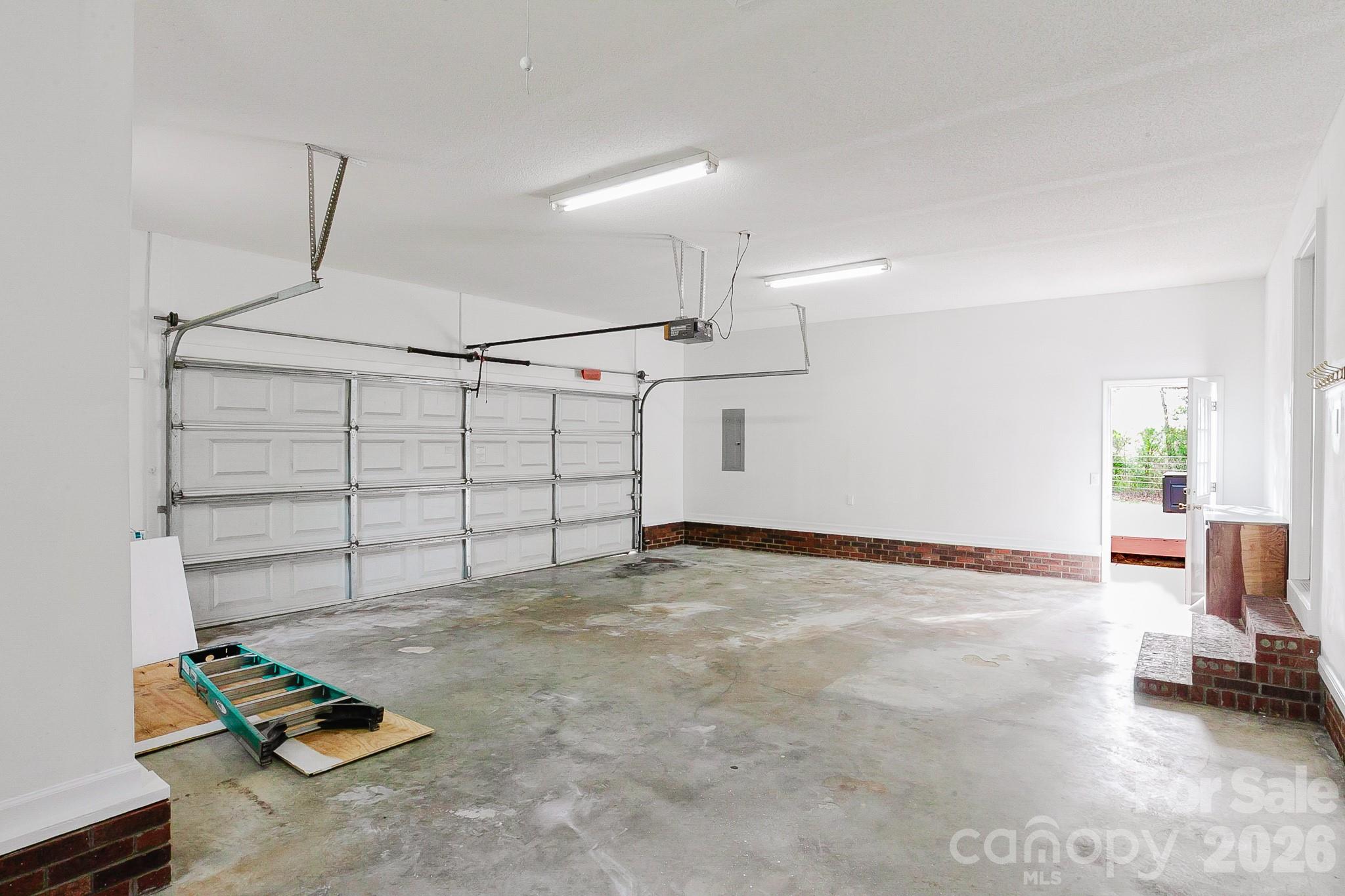 2104 Badin Road Albemarle, NC 28001 - Photo 22 of 46 a view of a room with gym equipment and a table