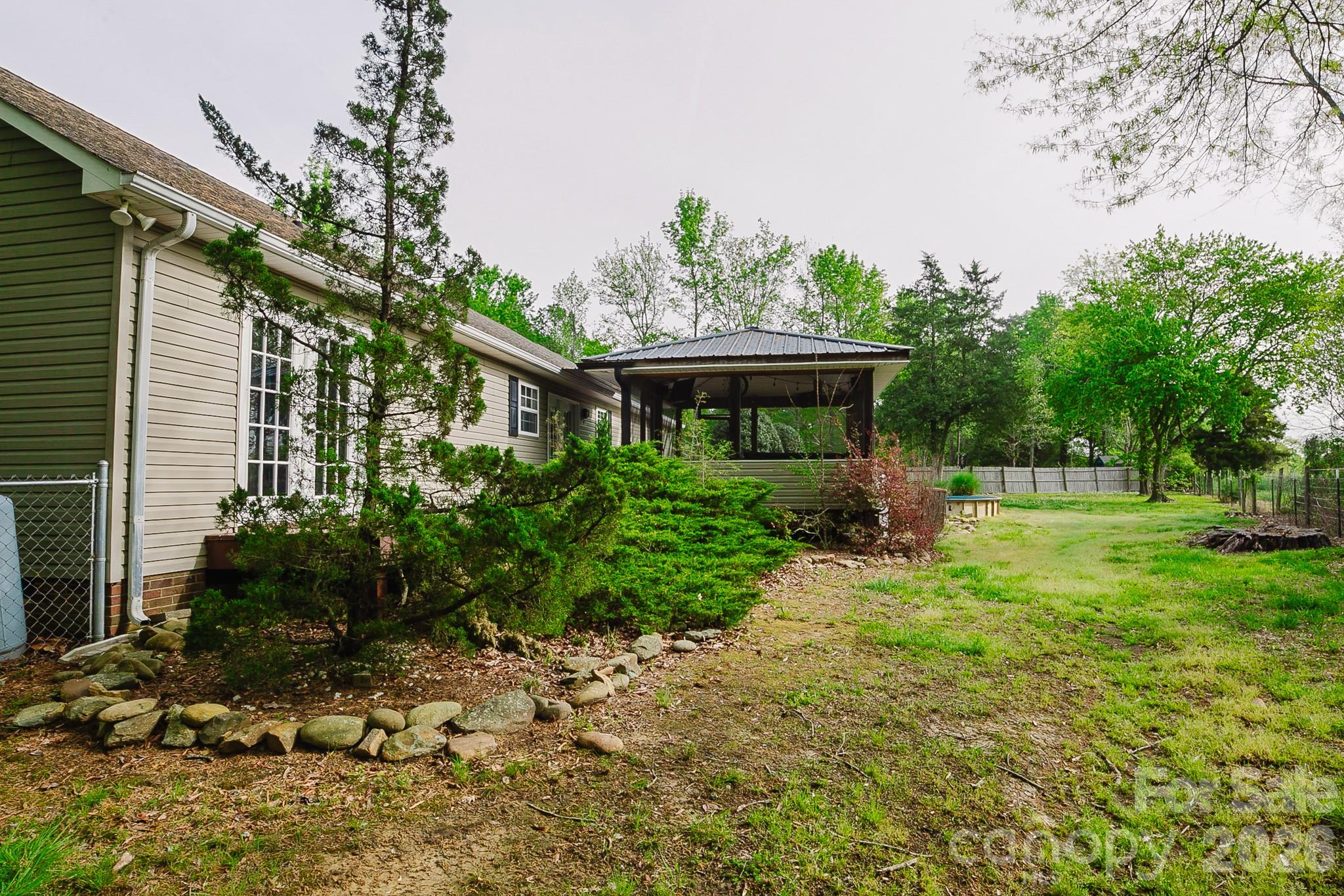 2104 Badin Road Albemarle, NC 28001 - Photo 26 of 46 a front view of a house with a yard