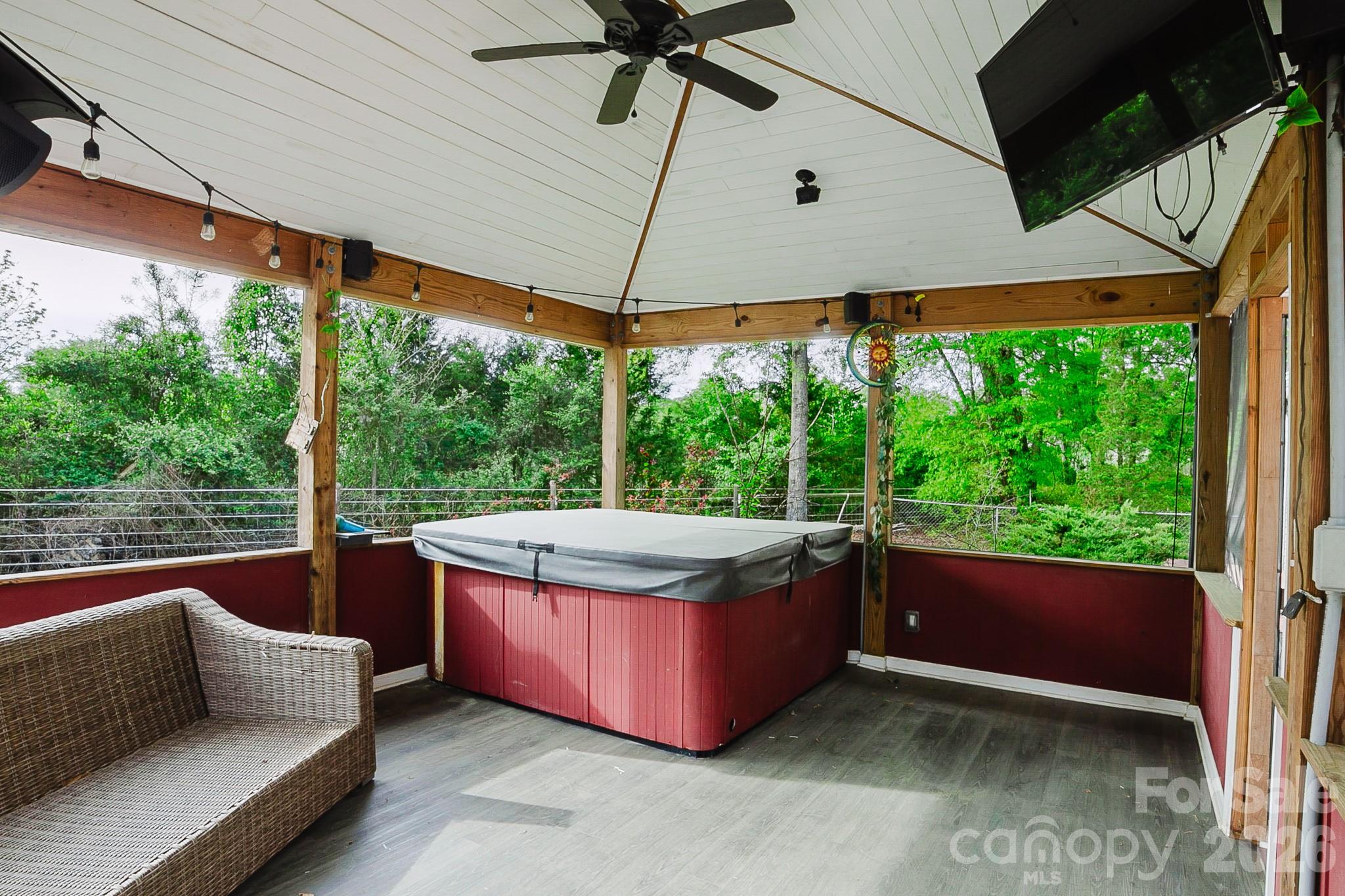 2104 Badin Road Albemarle, NC 28001 - Photo 29 of 46 a view of an outdoor sitting area with a tub