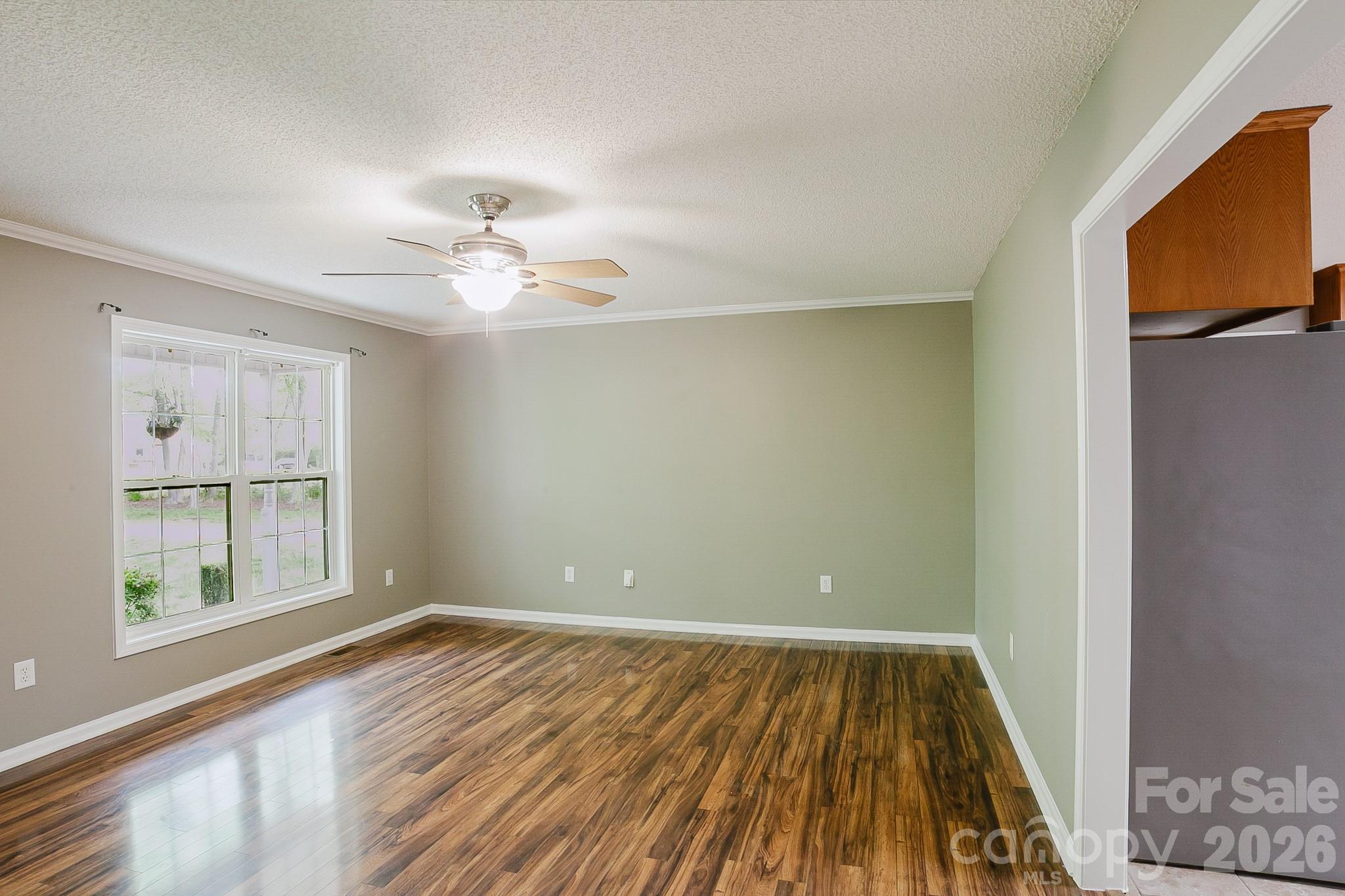 2104 Badin Road Albemarle, NC 28001 - Photo 3 of 46 wooden floor in an empty room with a window