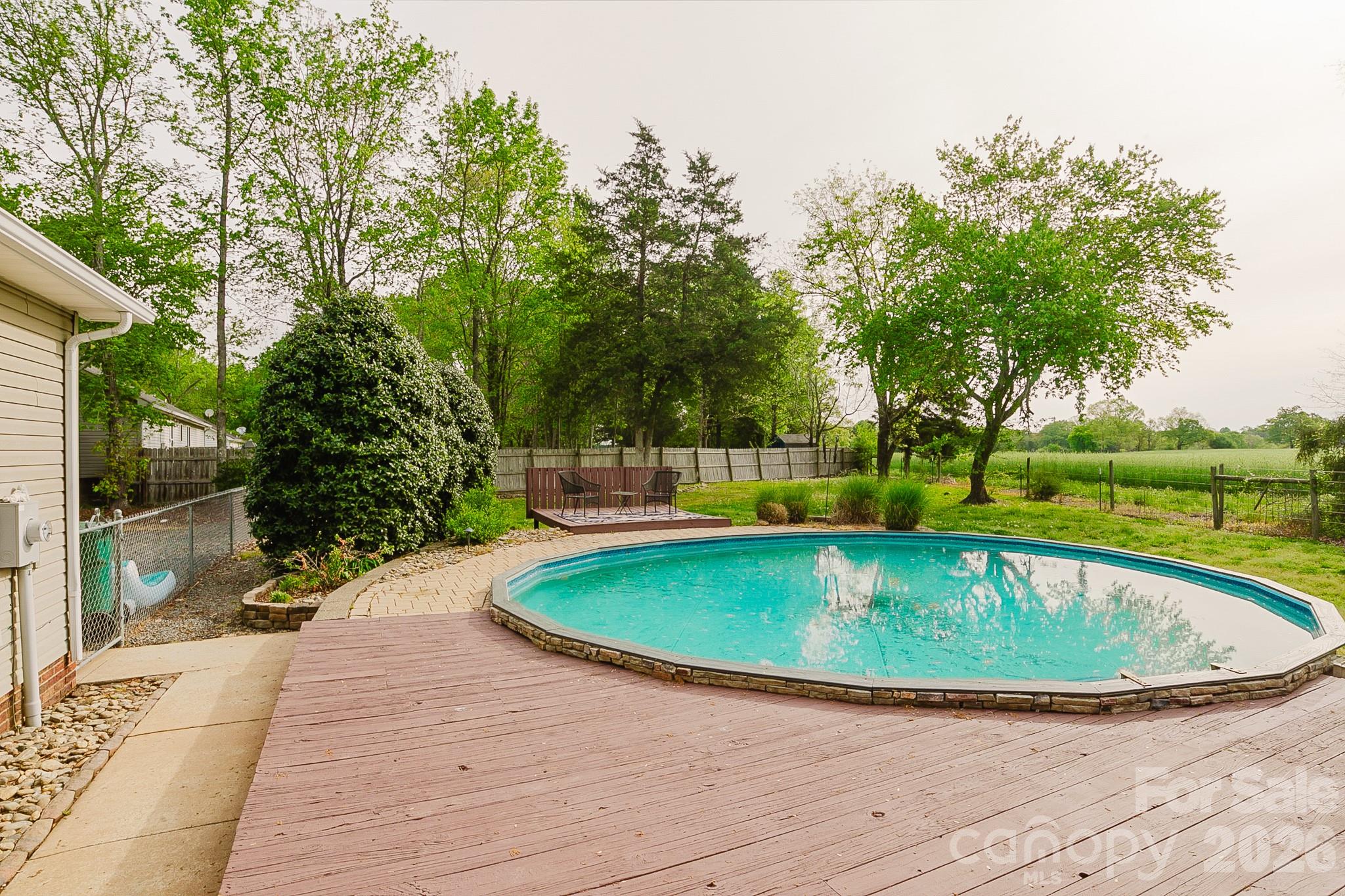 2104 Badin Road Albemarle, NC 28001 - Photo 33 of 46 a view of a swimming pool with a yard