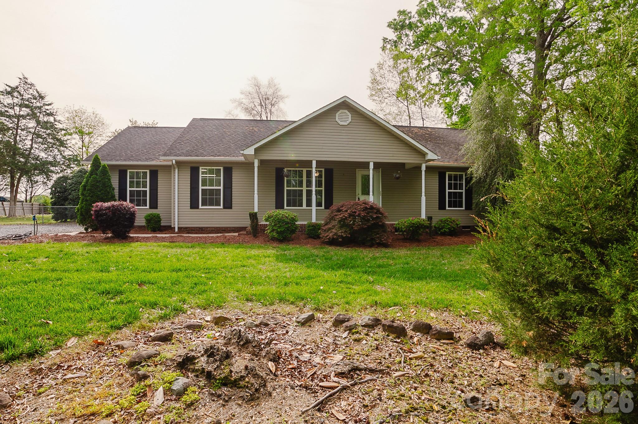 2104 Badin Road Albemarle, NC 28001 - Photo 34 of 46 a front view of house with yard and green space