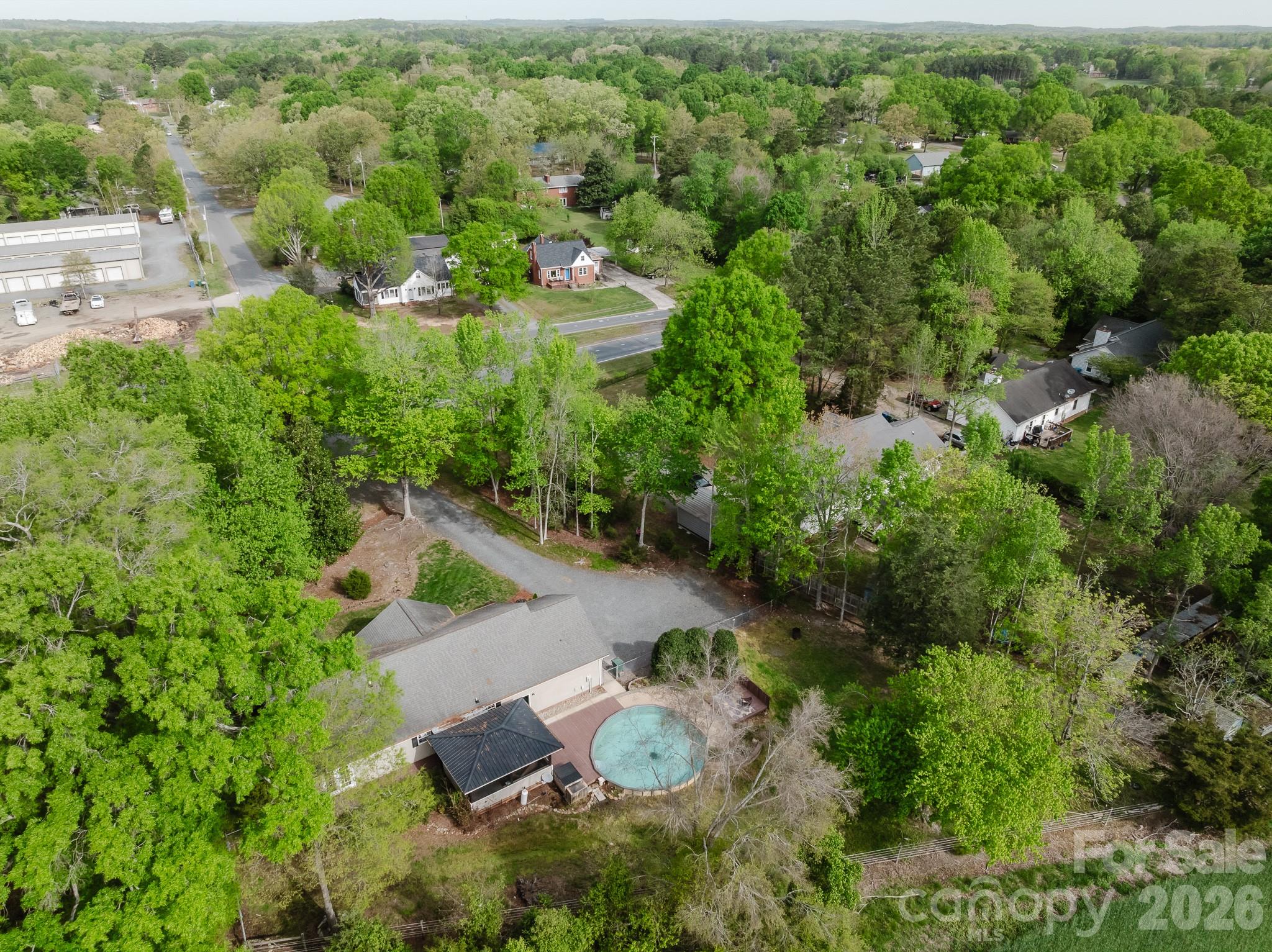 2104 Badin Road Albemarle, NC 28001 - Photo 46 of 46 an aerial view of a house with yard