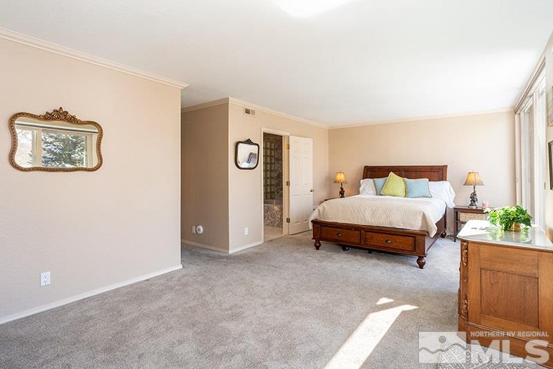 1344 Jones Street Reno, NV 89503 - Photo 15 of 24 a bedroom with a bed and a painting on the wall