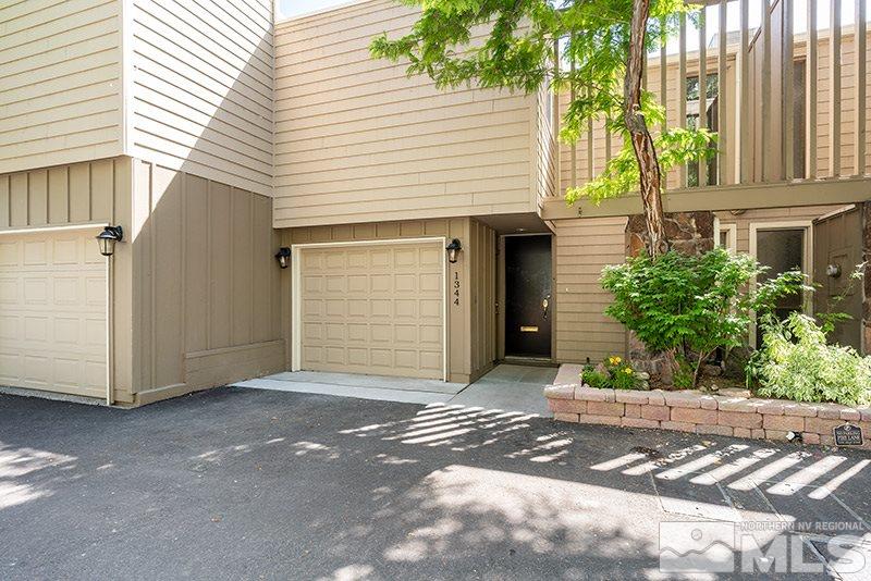 1344 Jones Street Reno, NV 89503 - Photo 2 of 24 a view of a house with a yard and potted plants