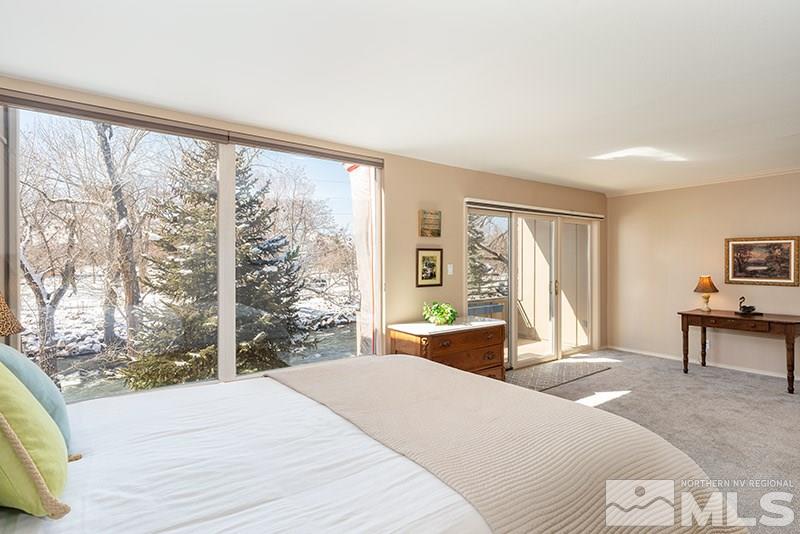 1344 Jones Street Reno, NV 89503 - Photo 10 of 24 a bedroom with a bed and a large window