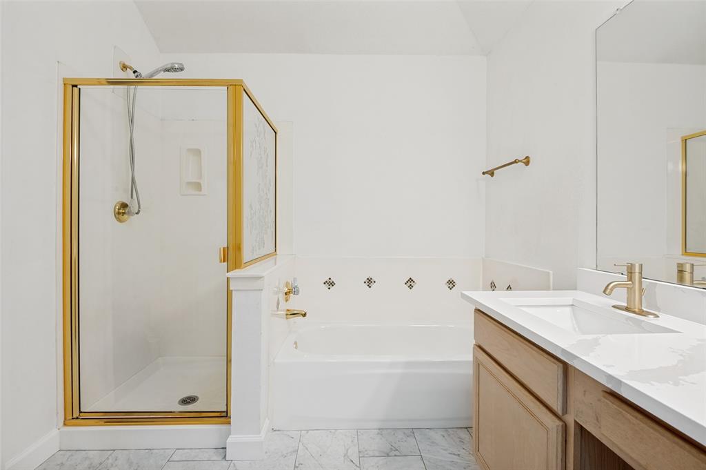 8160 Tower Road Frisco, TX 75035 - Photo 18 of 25 a bathroom with a shower and a sink