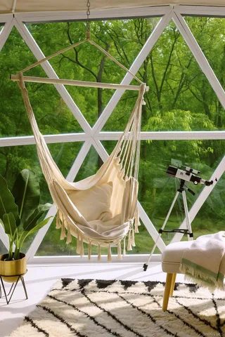 a view of a dining room with furniture large windows and plants