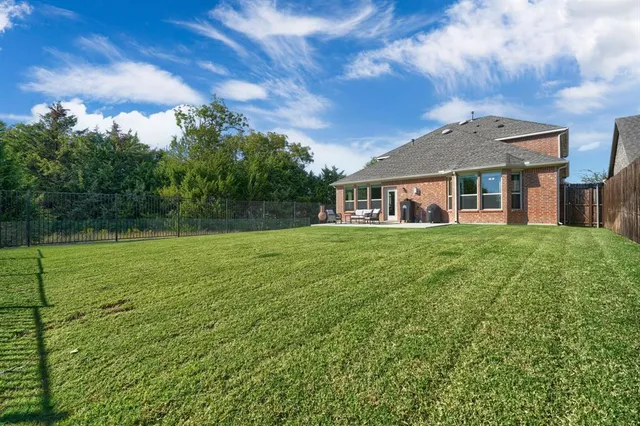 a house view with a garden space