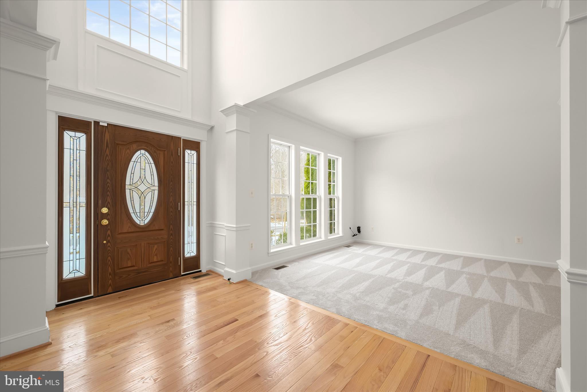 8433 Roberts Road Ellicott City, MD 21043 - Photo 11 of 84 2-story grand foyer w/ Pella wood door