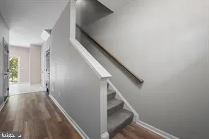 a view of entryway with stairs