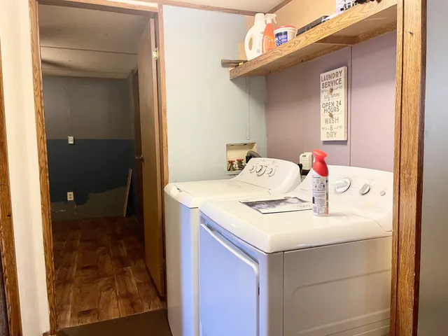 a bathroom with a sink vanity and a mirror