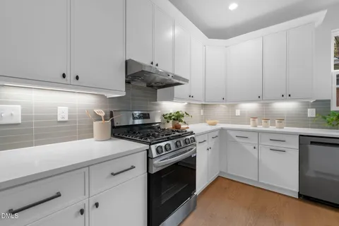 a view of room with window and stairs