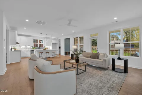 a bathroom with bathtub and window