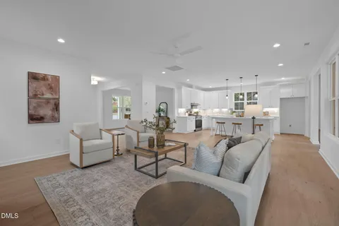 a bathroom with a bathtub a sink and a window