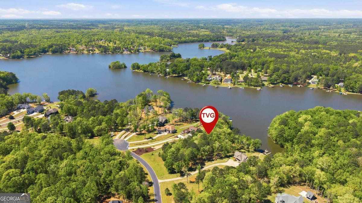 1310 Sailview Drive Buckhead, GA 30625 - Photo 1 of 16 an aerial view of lake and residential houses with outdoor space