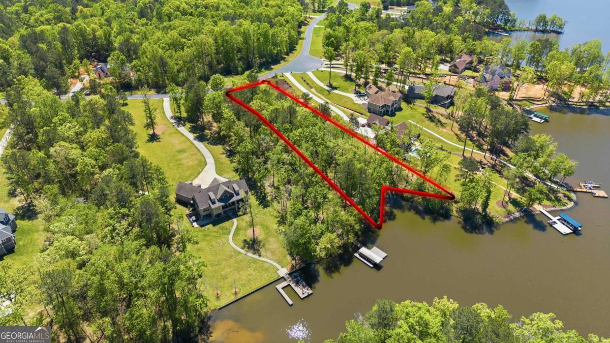 1310 Sailview Drive Buckhead, GA 30625 - Photo 12 of 16 an aerial view of a house with a yard and lake view
