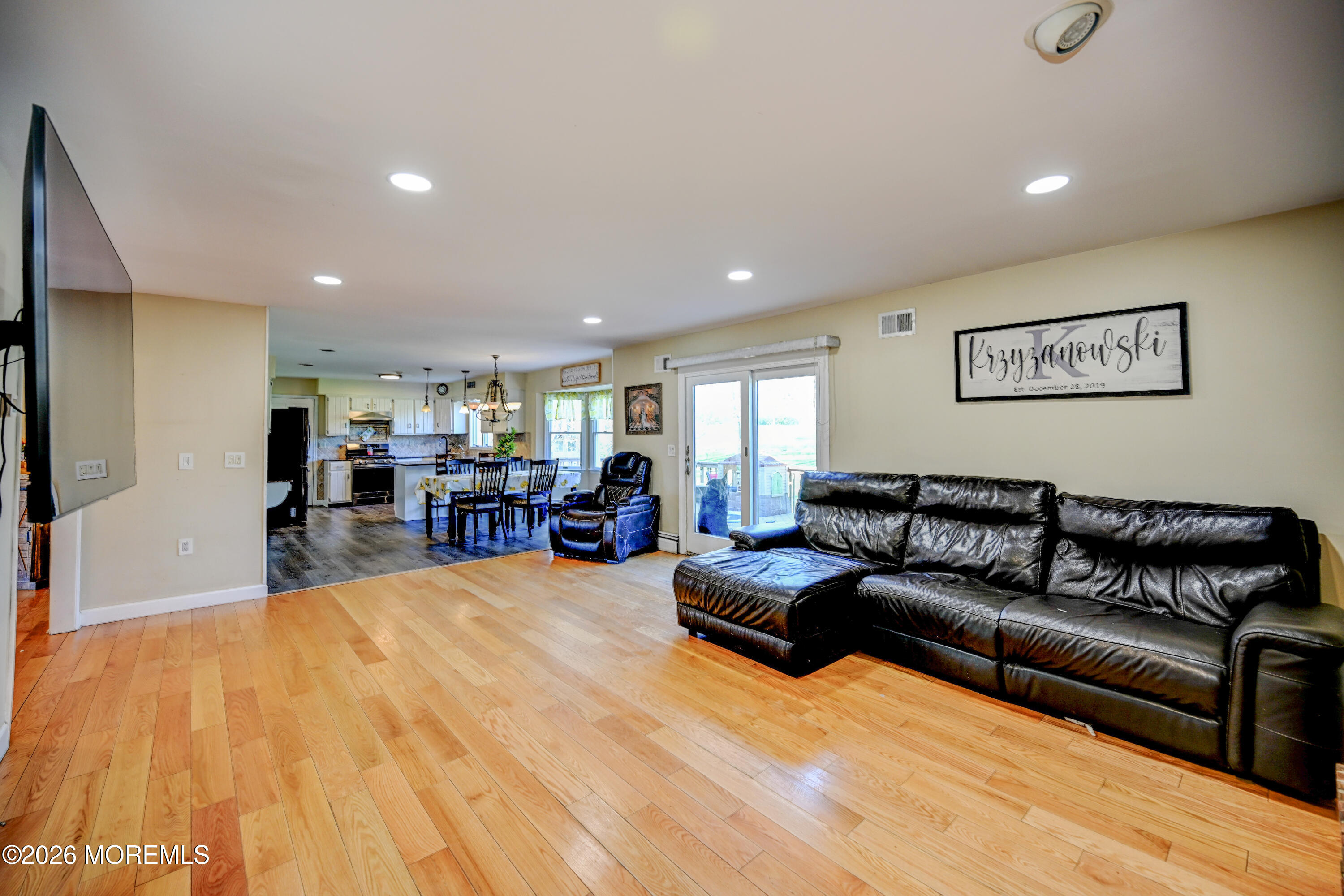 23 Red Hawk Road South Colts Neck, NJ 07722 - Photo 20 of 70 20-Family Room to Kitchen