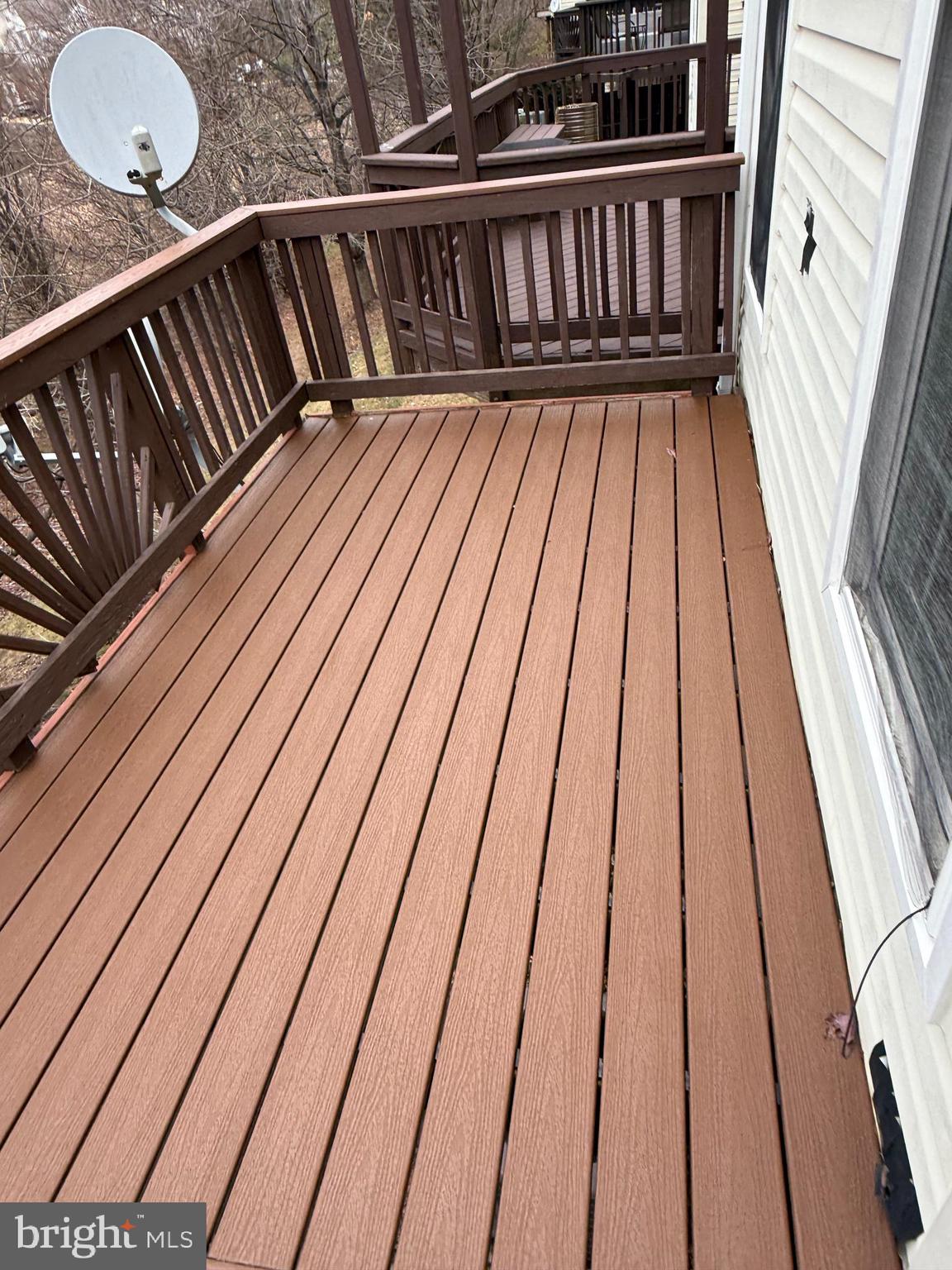 12976 Park Crescent Circle Herndon, VA 20171 - Photo 10 of 15 a balcony with view of wooden floor