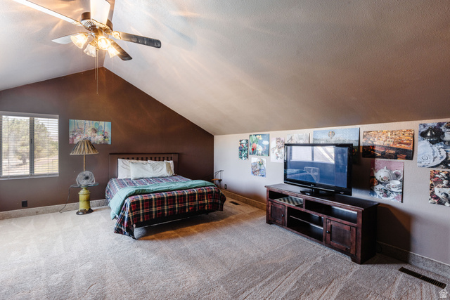 1470 Redwood Tree Street St. George, UT 84790 - Photo 32 of 53 Carpeted room featuring a sloped ceiling and a window with blinds