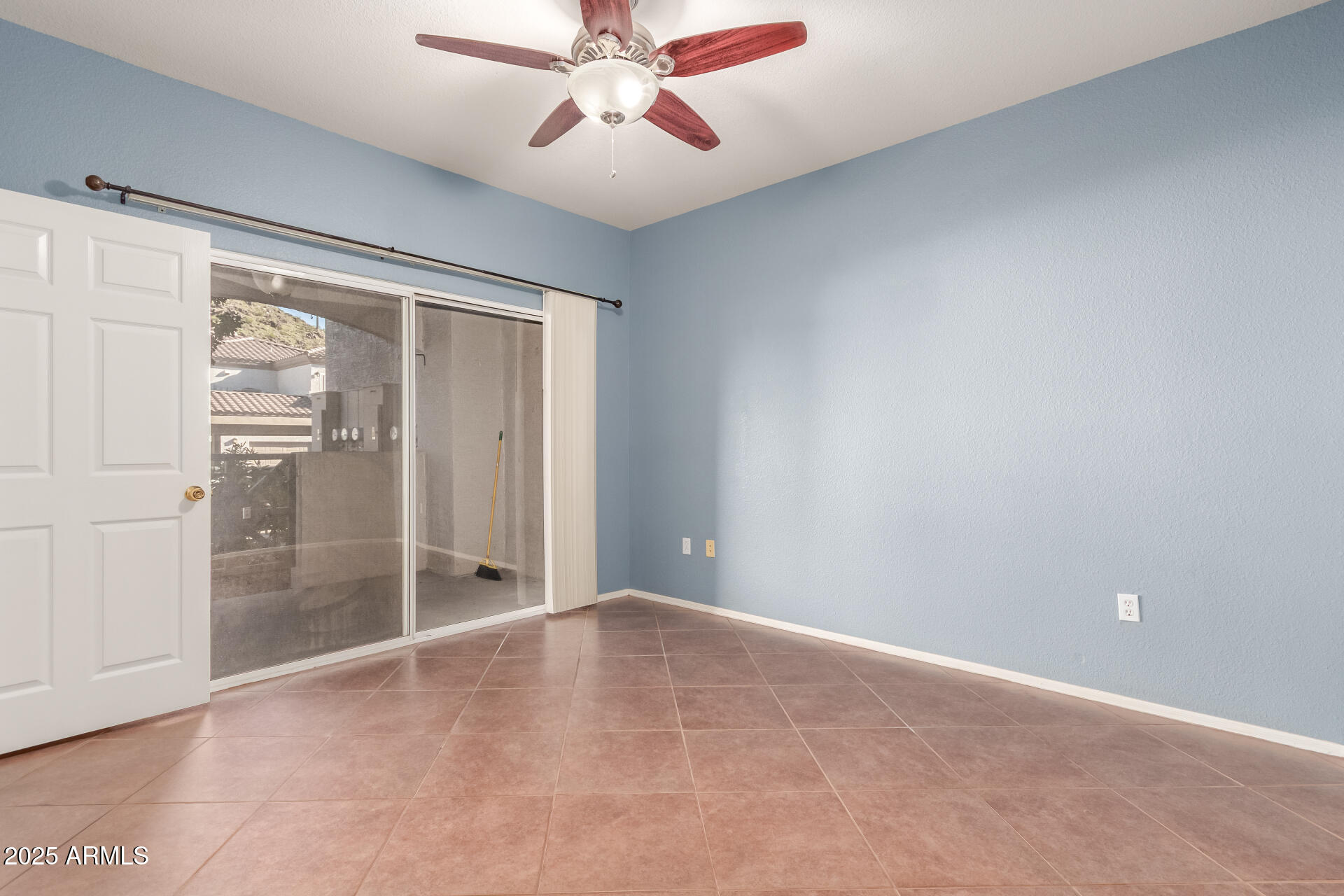 3236 East Chandler Boulevard, Unit 1082 Phoenix, AZ 85048 - Photo 20 of 28 a view of an empty room with a window