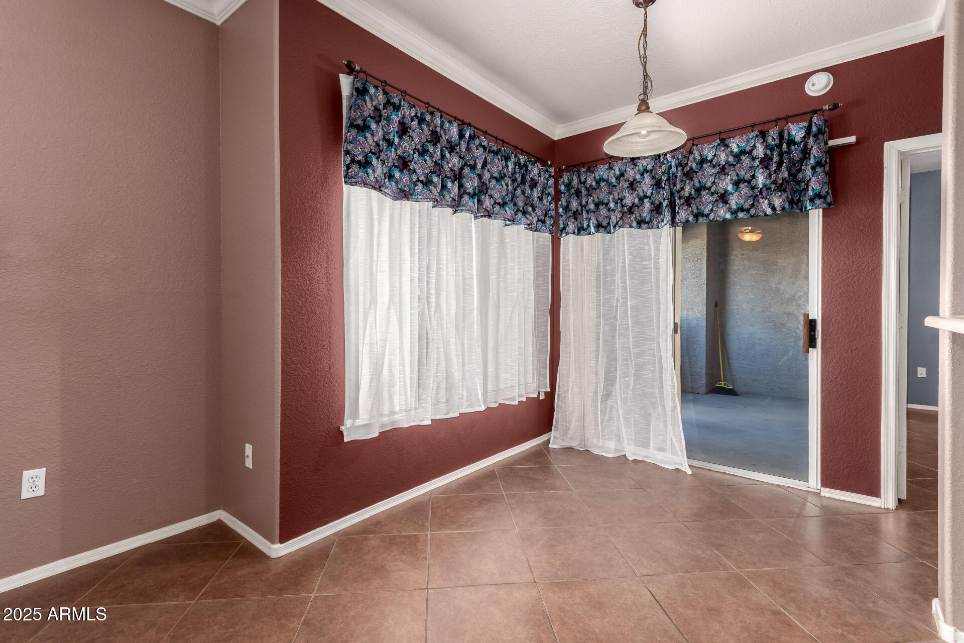 3236 East Chandler Boulevard, Unit 1082 Phoenix, AZ 85048 - Photo 9 of 28 a view of a room with a windows and chandelier