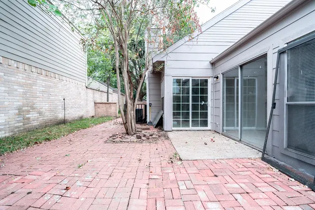 a view of a backyard with a large window