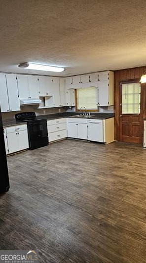 603 Anderson Avenue Fort Valley, GA 31030 - Photo 3 of 9 a large kitchen with stainless steel appliances granite countertop a large counter top a stove a sink and a refrigerator
