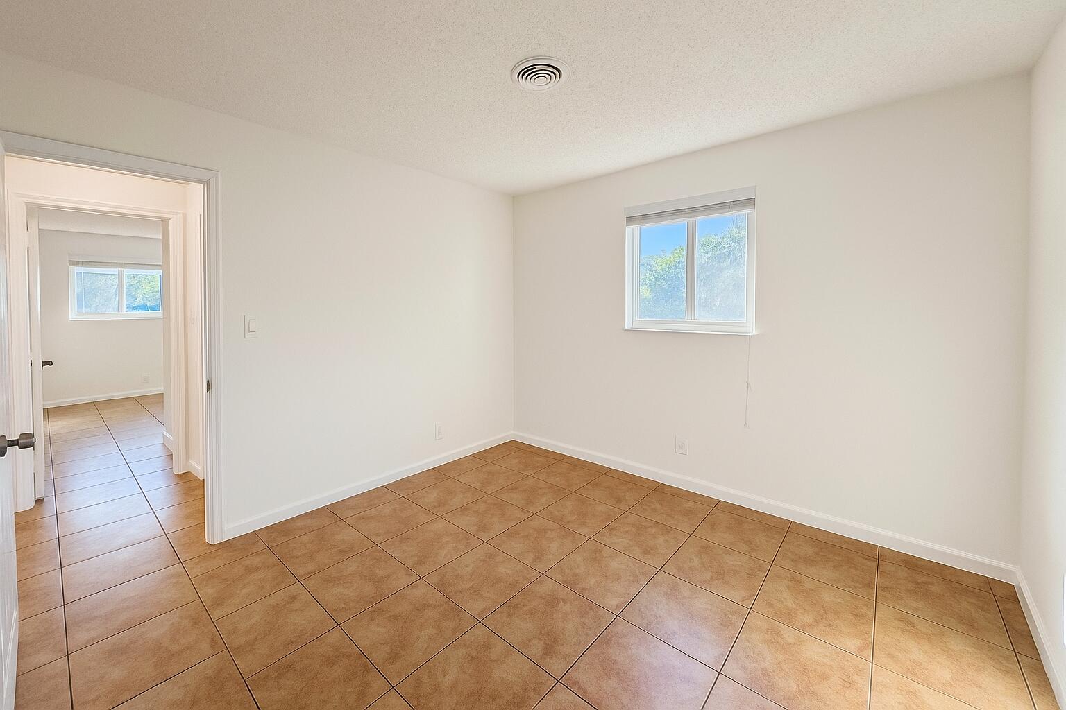 2920 Northeast 7th Avenue, Unit A Pompano Beach, FL 33064 - Photo 12 of 16 3rd Bedroom